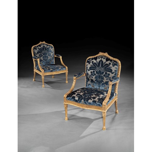A Pair of George III Period Carved and Gilded Armchairs attributed to John Linnell